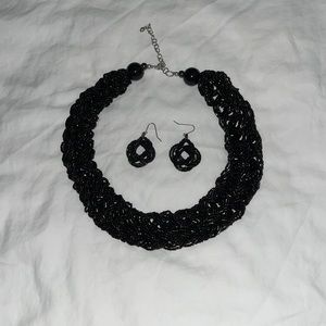 Black bead necklace/choker with matching earrings.